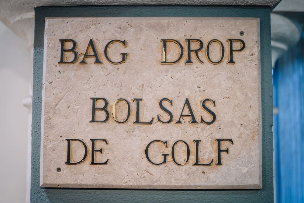 bag drop sign Spanish